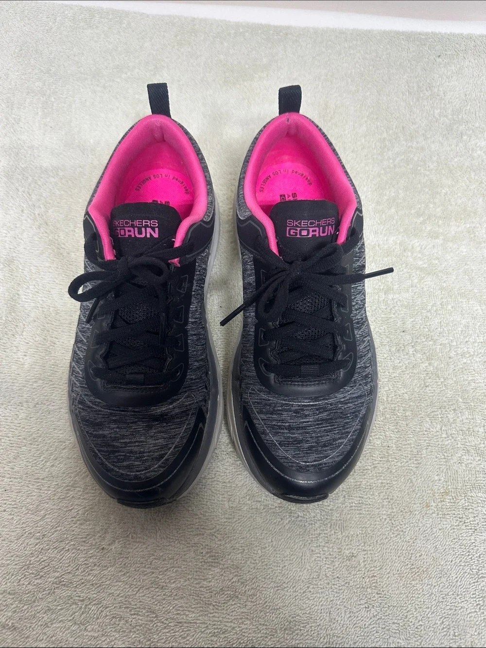 Skechers GO RUN Women's Black Athletic Sneakers with Hot Pink Interior